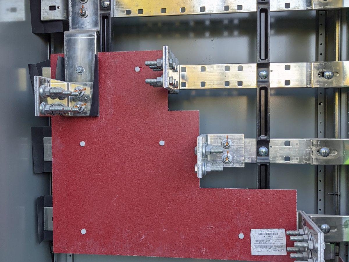 Bus duct with visible bus bars in commercial installation - AMY Electric