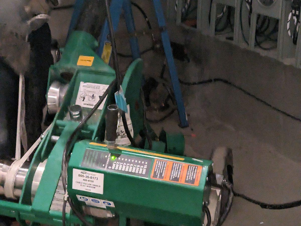 Electrical equipment in dimly lit area — featuring electrical panel enclosure (work in progress) - AMY Electric Los Angeles