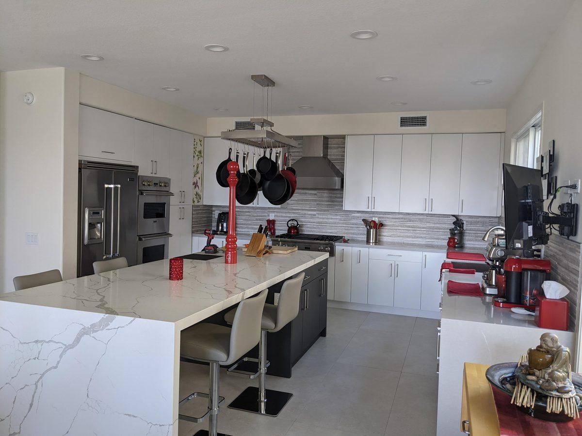 Finished kitchen with pendant light installation and modern fixtures - AMY Electric