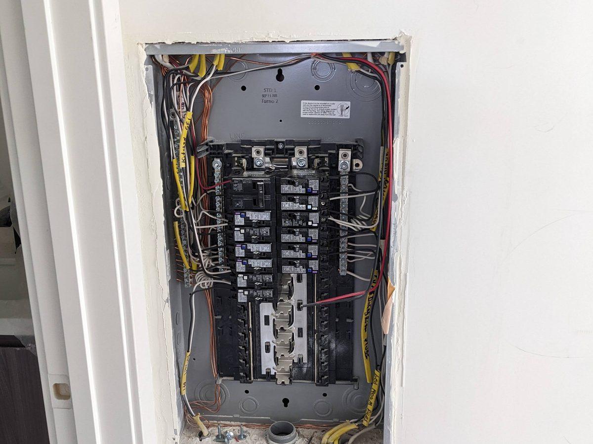 New panel installation in finished drywall - AMY Electric