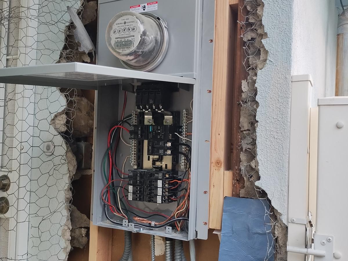 New panel interior with wired breakers during Winnetka service upgrade - AMY Electric
